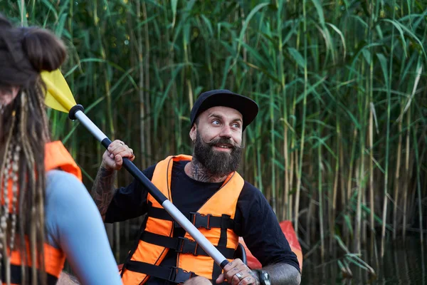 Portrait of tattooed guy in kayak — Stock Photo, Image