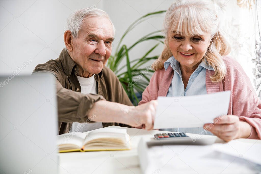 Couple with financial documents