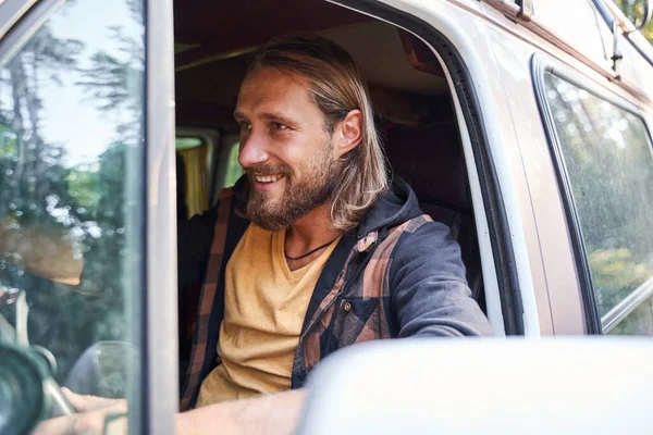 Man looking away while riding at the car — Stock Photo, Image