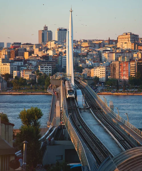 Golden Horn Metro bridge in Istanbul, Turkey and view of Golden Horn