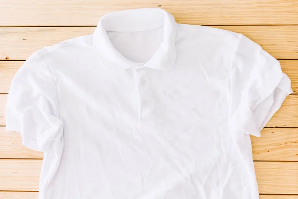 White Shirt Wooden Table — Stock Photo, Image