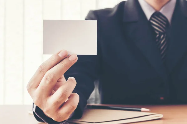 Businessman Holding His Blank White Card — Stock Photo, Image