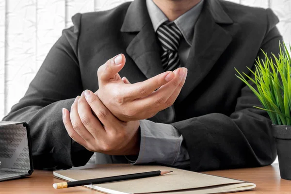 Businessman Suffering Wrist Pain — Stock Photo, Image