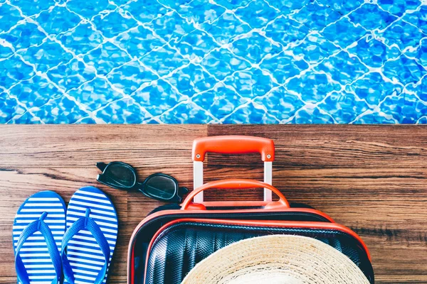 Summer accessories on the swim pool