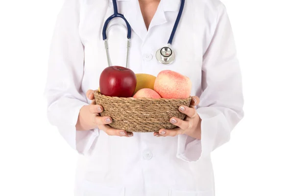 医生持有新鲜水果隔离白色背景 — 图库照片