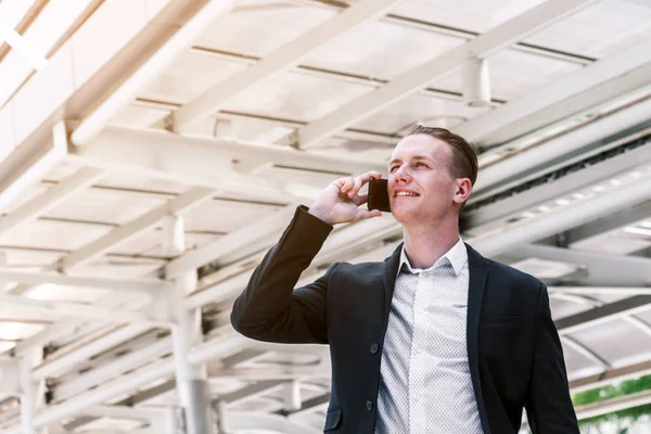 Handsome Businessman Using His Smartphone — Stock Photo, Image