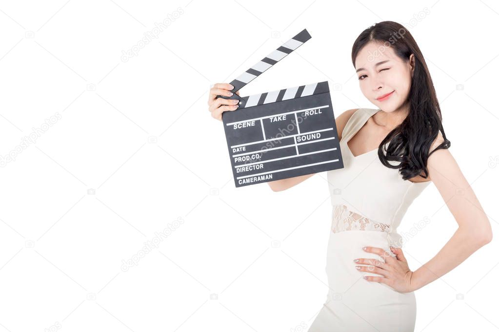 Young woman holding movie clapperboard isolated on white