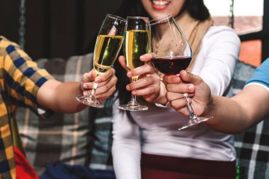 People cheers celebration with wine in restaurant clipart