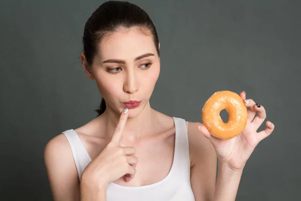 Woman Holding Calorie Bomb Donut Gray Background Junk Food Concept — Stock Photo, Image