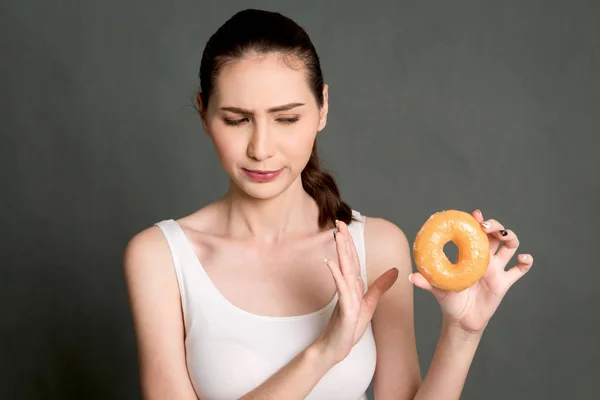 Woman Holding Calorie Bomb Donut Gray Background Junk Food Concept — Stock Photo, Image