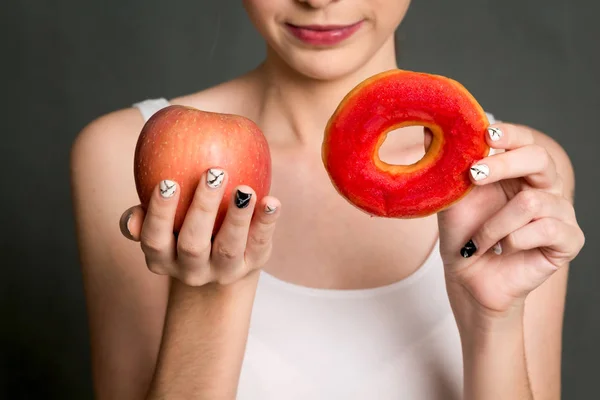 Woman Holding Making Choice Red Apple Calorie Bomb Donut Gray — Stock Photo, Image