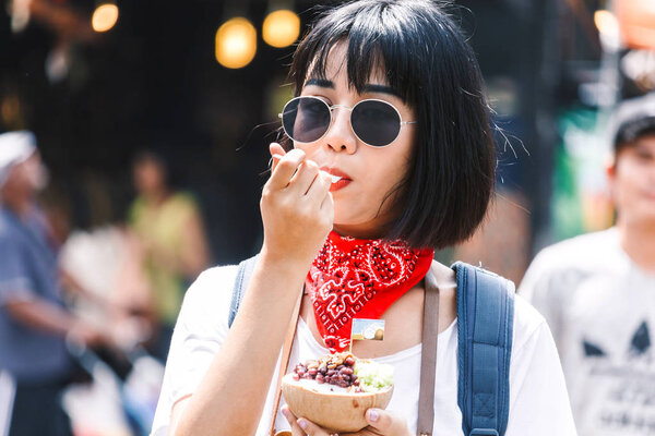 Asian woman tourist travel in jatujak market, bangkok, thailand