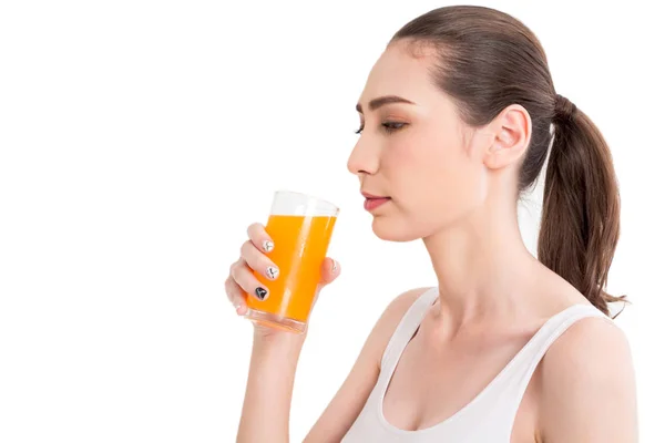 妇女举行橙汁分离在白色背景 — 图库照片