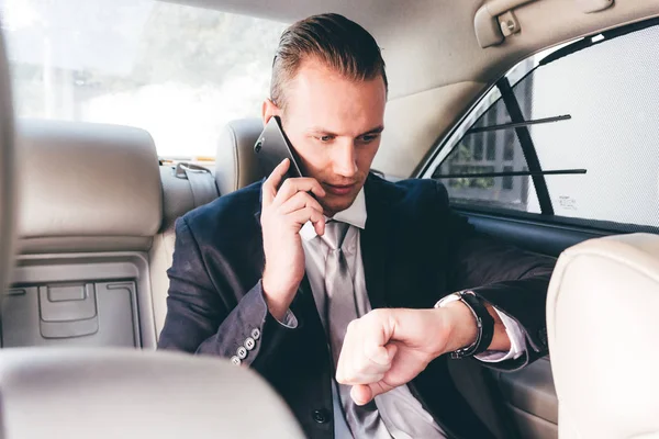 Businessman Looking His Watch Back Seat Car — Stock Photo, Image