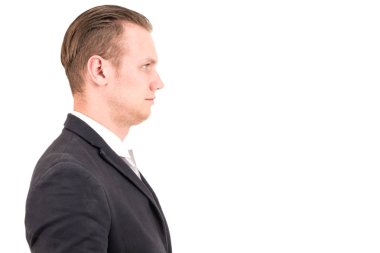 Genç yakışıklı işadamı izole beyaz arka plan üzerinde siyah takım elbise ile