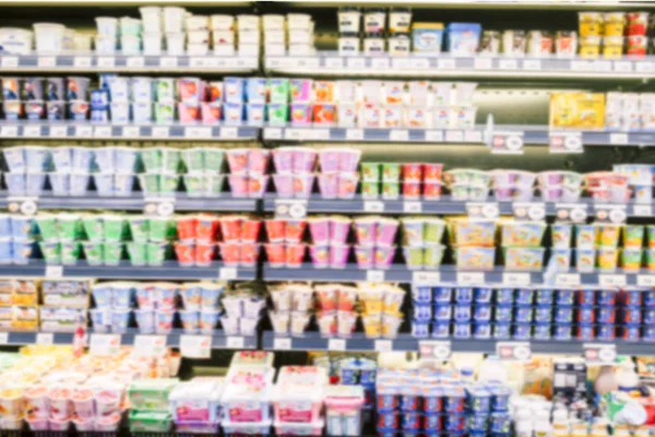 Desfocado Borrão Iogurte Prateleiras Supermercado — Fotografia de Stock