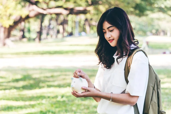 Woman Hand Putting Coin Piggy Bank Savings Finance Concept — Stock Photo, Image