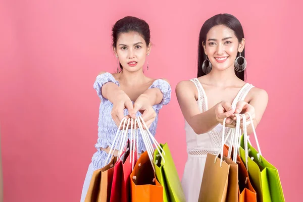 Portrait Two Beautiful Women Holding Shopping Bags Enjoying Shopping Pink — Stock Photo, Image