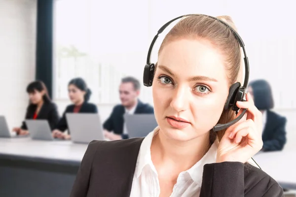 Beautiful businesswoman customer support services working at call center