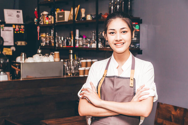 Barista Stand in front of counter bar in coffee shop restaurant