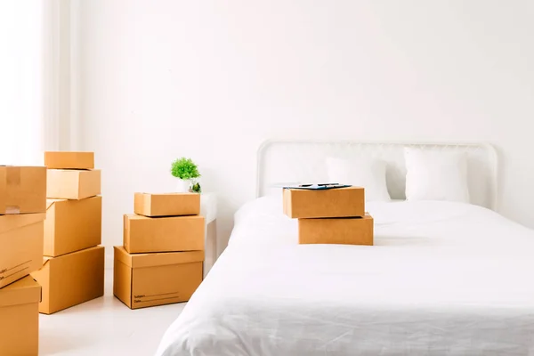 Pile of cardboard box on bed.SME business online and delivery concept