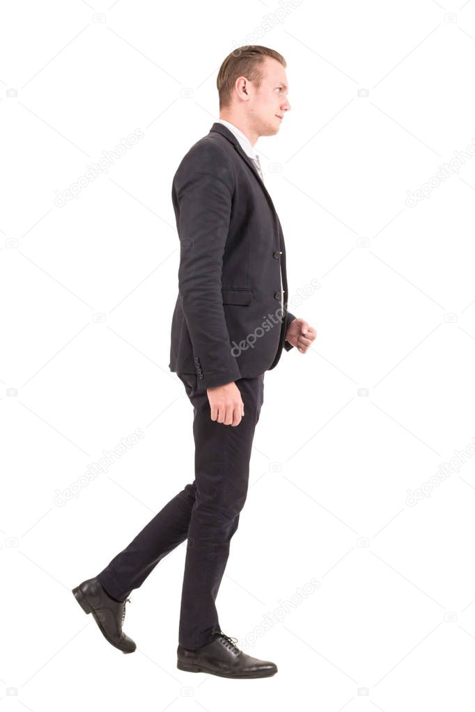 Businessman walking forward isolated on white background