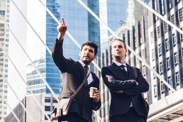 Two Smiling Businessman Coworkers Black Suit Talking Walking Business People — Stock Photo, Image