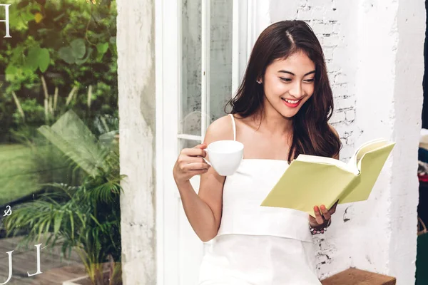 Beautiful Young Woman Relaxing Holding Cup Coffee Reading Book Cafe — Stock Photo, Image