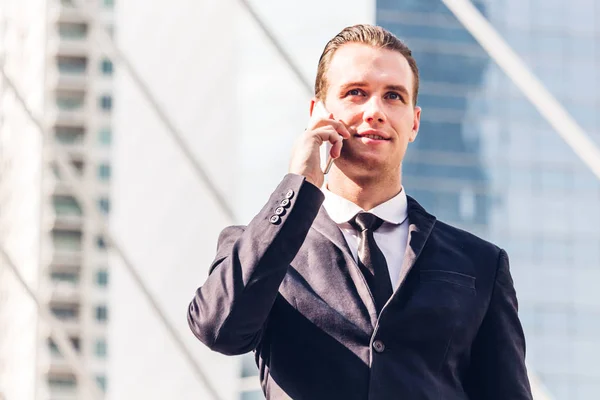 Portrait Handsome Businessman Black Suit Standing Using Smartphone Outdoors Modern — Stock Photo, Image