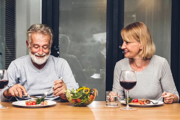 Senior Couple Relax Eating Dinner Drinking Wine Glasses Together Kitchen — Stock Photo, Image