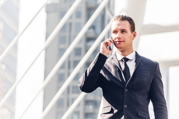 Portrait Handsome Businessman Black Suit Standing Using Smartphone Outdoors Modern — Stock Photo, Image