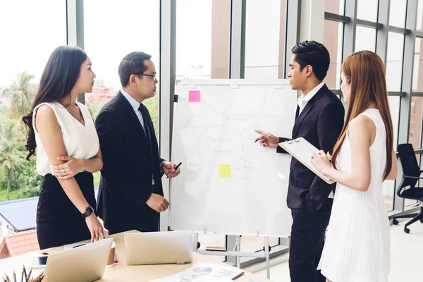 Group of casual business discussing and working with laptop comp — Stock Photo, Image