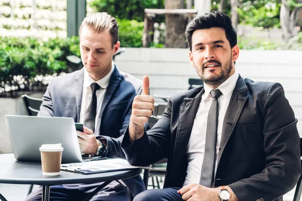 Image of two businessman coworkers in black suit talking and wor — Stock Photo, Image