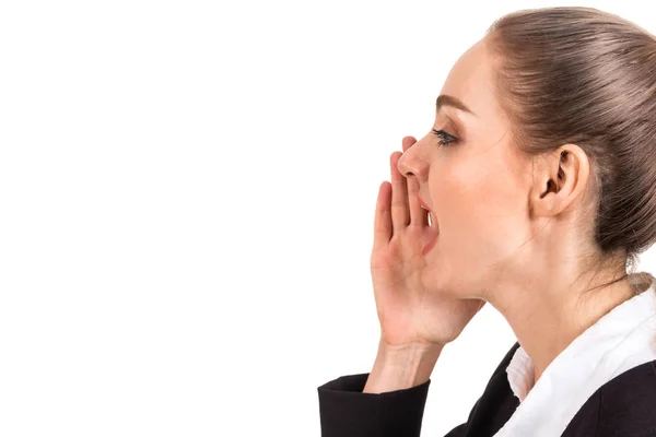 Businesswoman whispering gossip isolated on white background — Stock Photo, Image