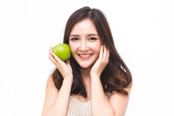 Woman holding and eating fresh green apple on white background.d — Stock Photo, Image