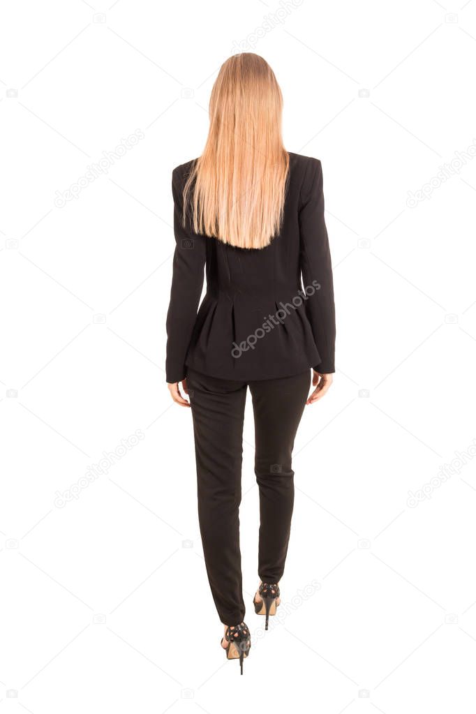 Businesswoman walking forward isolated on white background