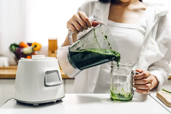 Healthy woman enjoy making green vegetables detox cleanse and gr — Stock Photo, Image