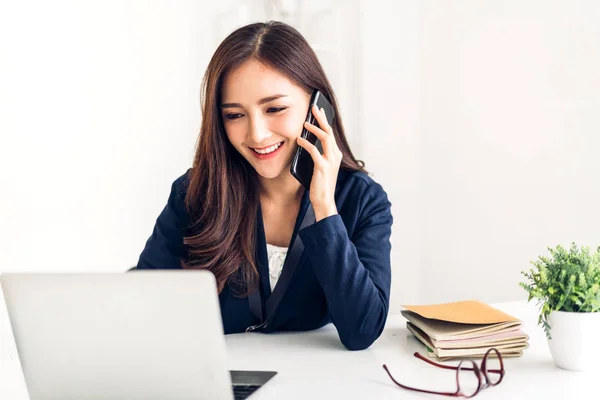 Businesswoman sitting and working with laptop computer.creative