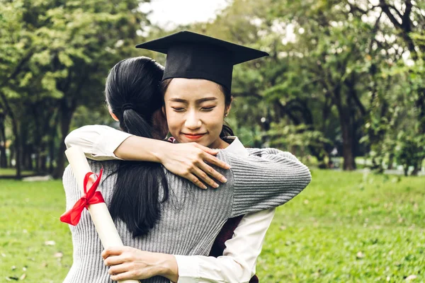 Successful of student young woman and bachelor gowns with diplom — Stock Photo, Image