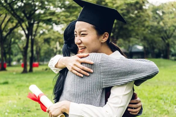 Successful of student young woman and bachelor gowns with diplom — Stock Photo, Image