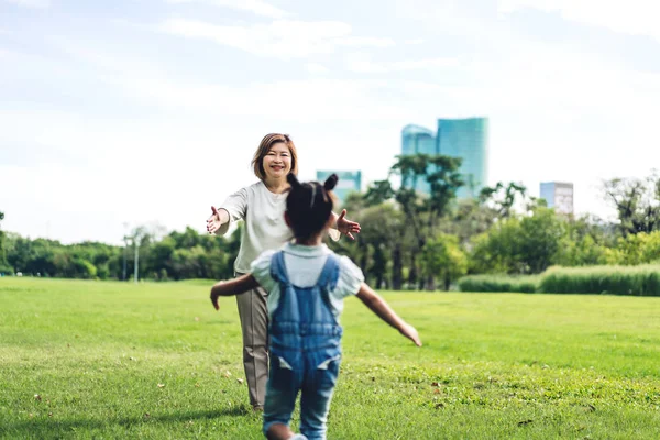 Portrait of happy grandmother and little cute girl enjoy relax t — Stock Photo, Image