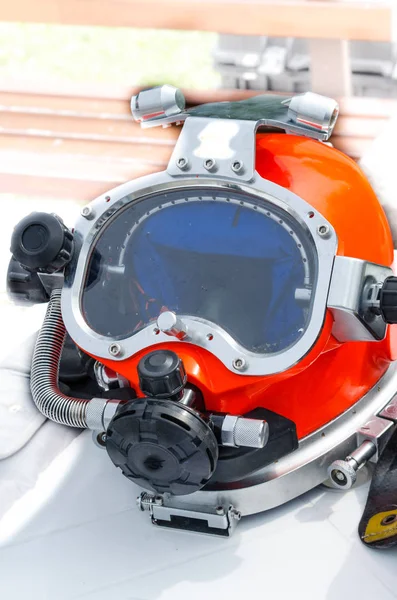 Modern lightweight diving helmet is on the exhibition table