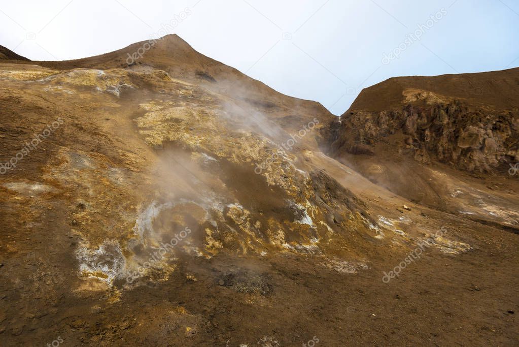 Vapor and sulfurous smoke coming from numerous fumaroles in Viti crater at Askja caldera. Central Highlands of Iceland