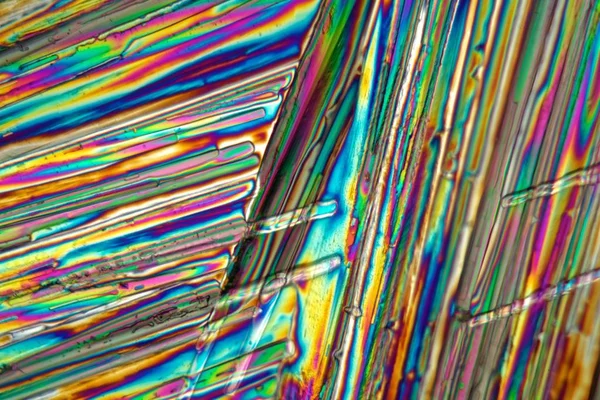 Cloreto de estrôncio ao microscópio e sob luz polarizada . — Fotografia de Stock