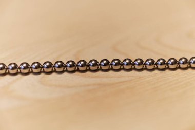 Chain of small steel balls clipart