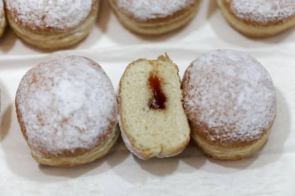 Krapfen covered with powdered sugar