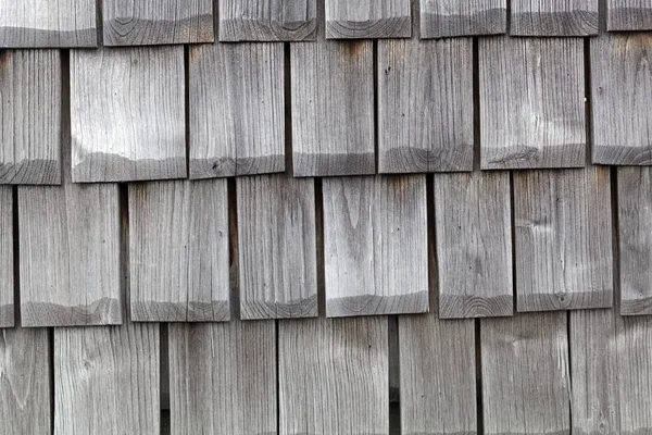 Wooden clapboards on a housewall — Stock Photo, Image