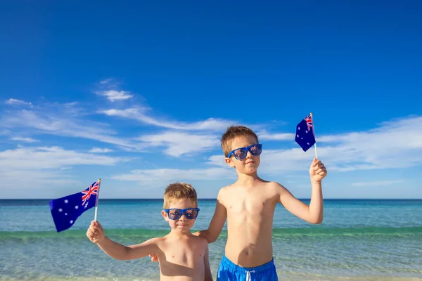 Kids holding Australian flags on Australia day