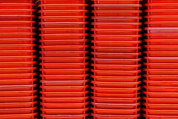 red plastic basket pattern background