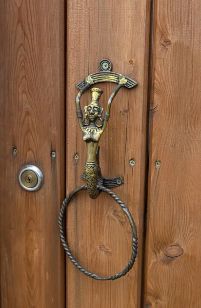 Closeup of the door with vintage doorknob, a lot of copyspace